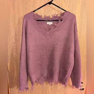 Cropped distressed v-neck sweater